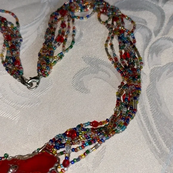 Handcrafted used multicolor Beaded Necklace w/lg. red metal hang dec. 8 strands - Picture 7 of 10